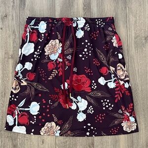 Mod sportswear skirt with built in shorts. XL. Purple floral pattern